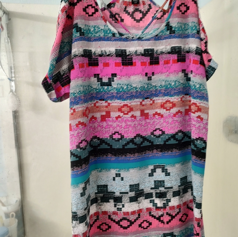 Metaphor dress. Multi color with sexy cut outs.